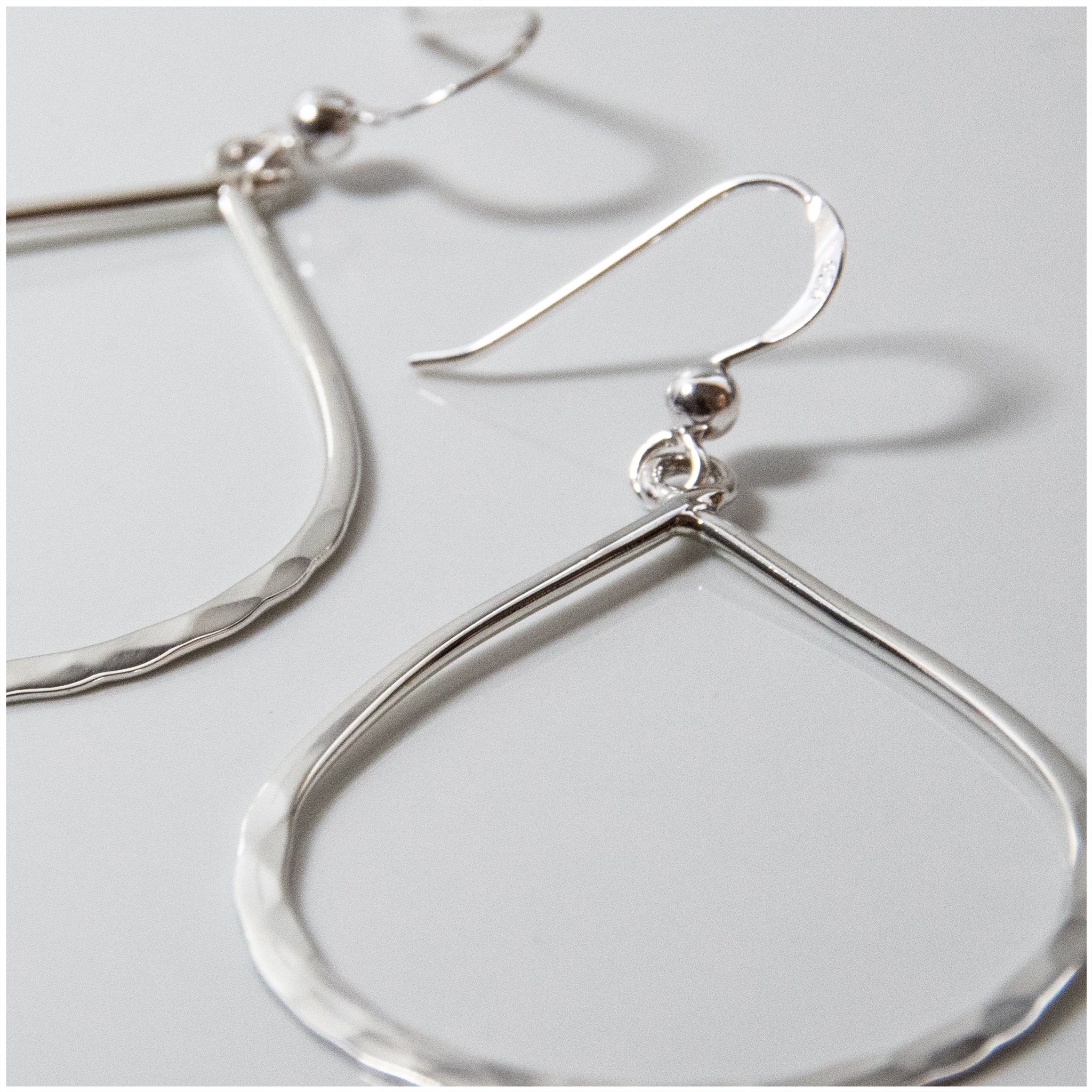 EL056 - Sterling Silver Teardrop Shaped Hook Earrings - silverby-e.co.za