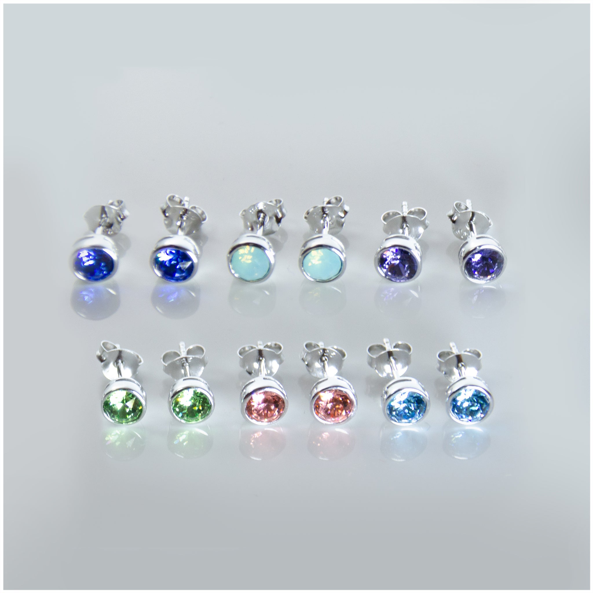 ES078 - Sterling Silver Push-Back Stud Earrings Decorated with Authentic Swarovski® Crystals - silverby-e.co.za