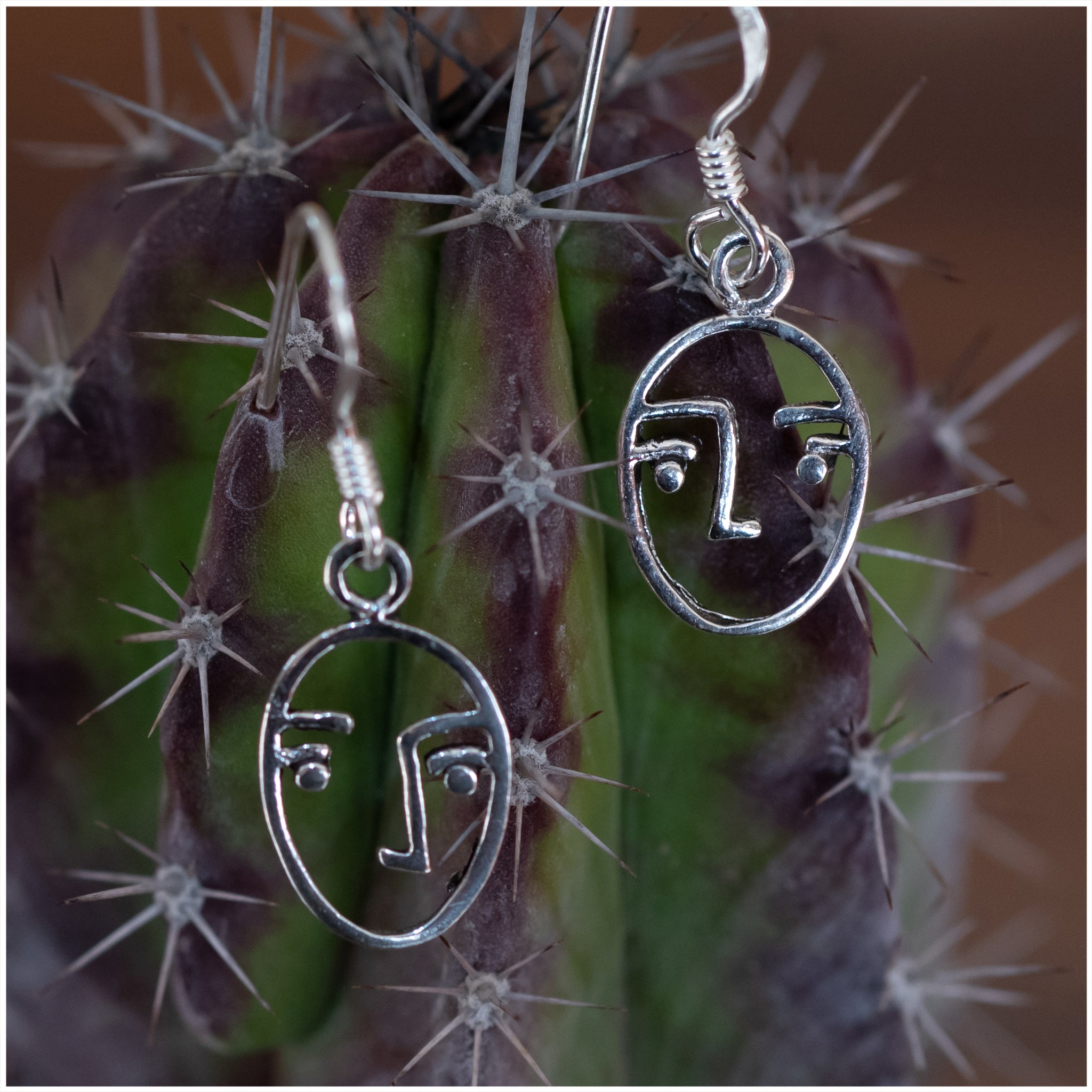 JEL003 - Sterling Silver Face Earrings - silverby-e.co.za