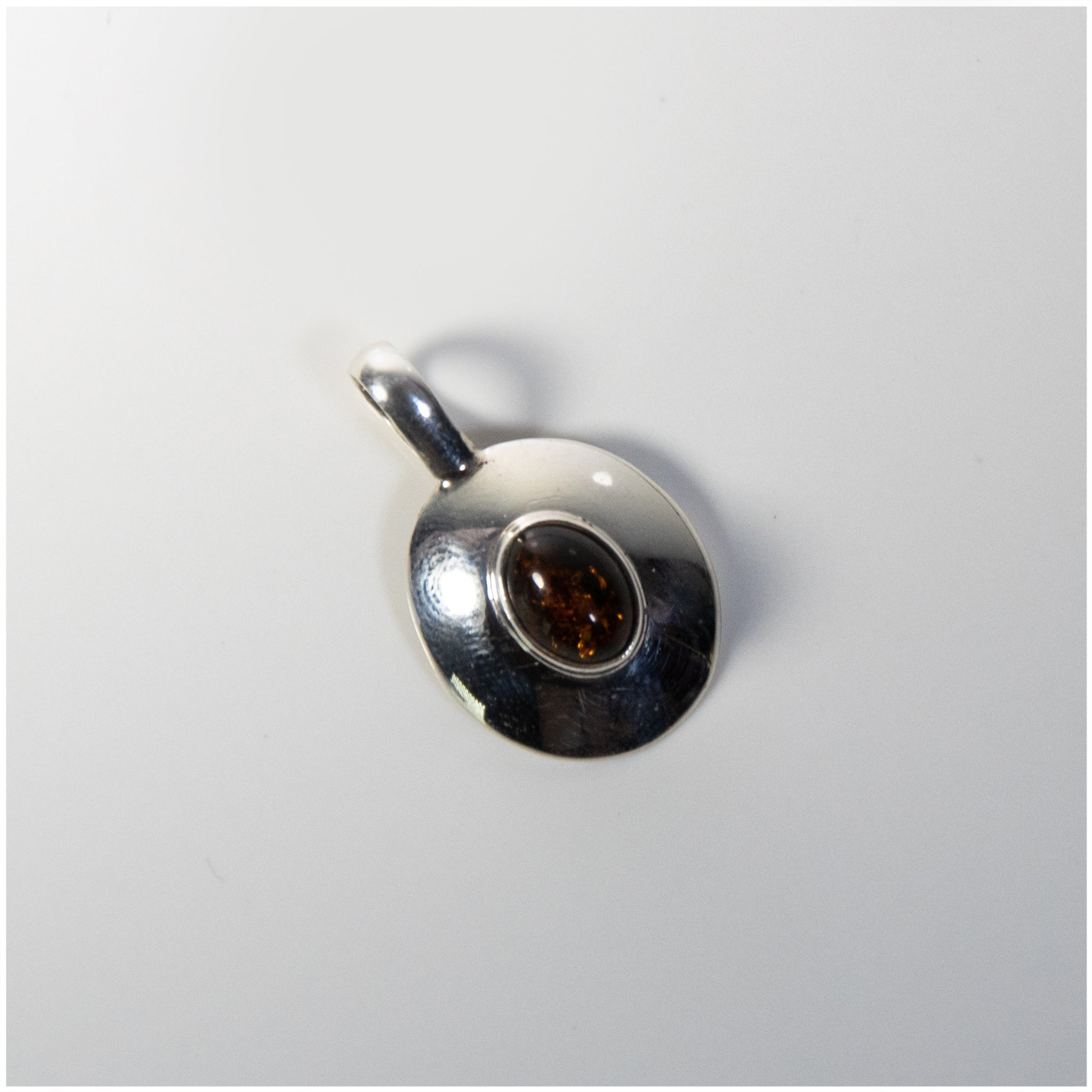 PSTON010 - Sterling Silver Oval Pendant, Decorated with Baltic Amber - silverby-e.co.za