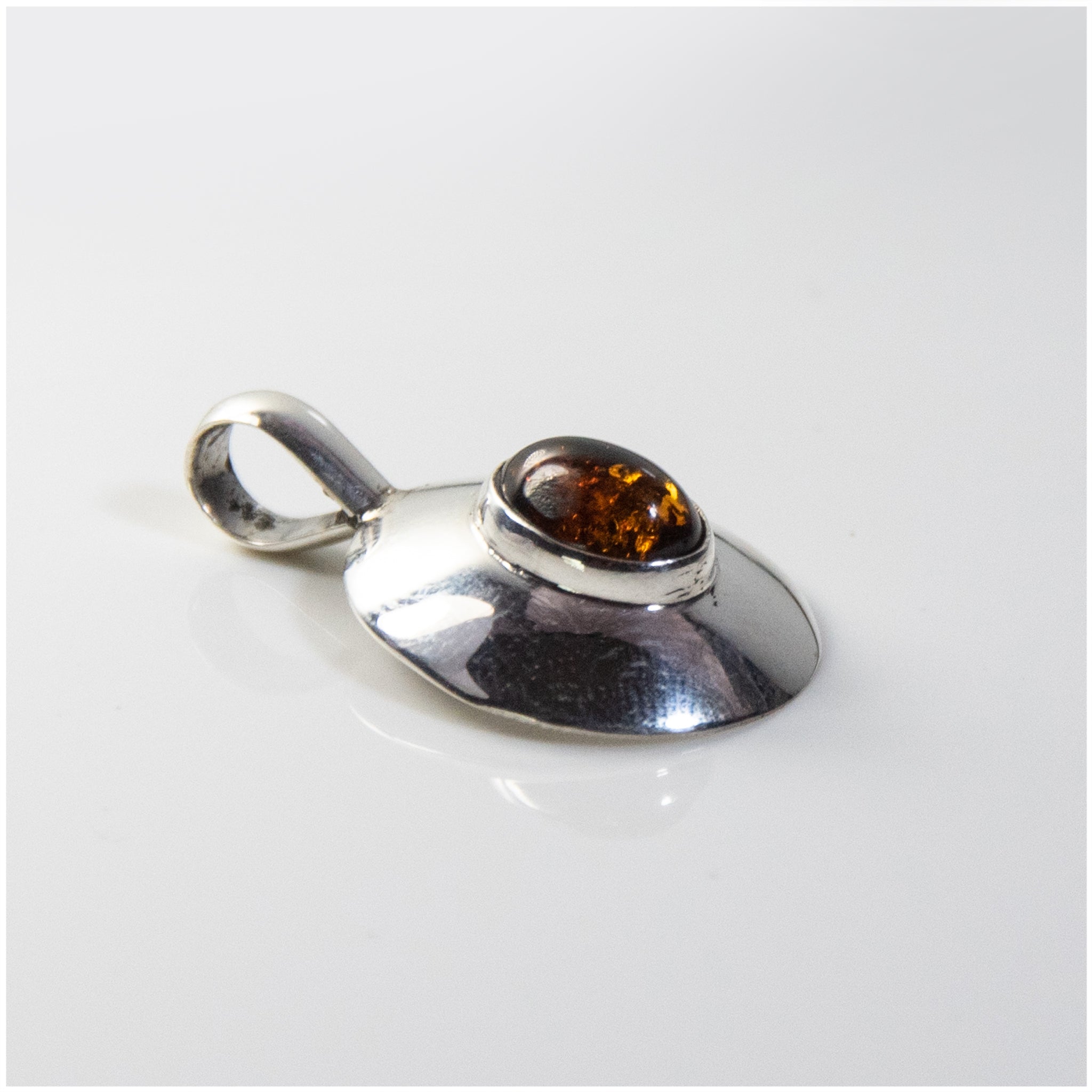 PSTON010 - Sterling Silver Oval Pendant, Decorated with Baltic Amber - silverby-e.co.za