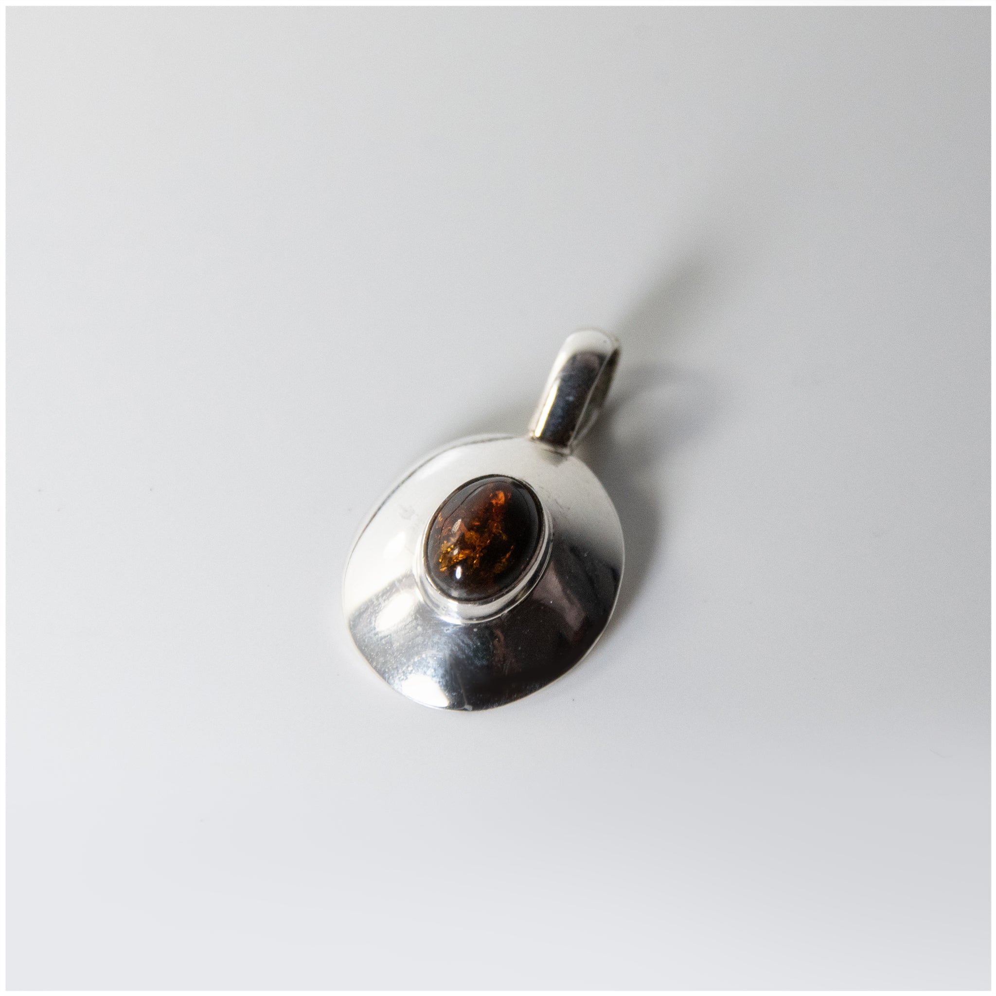 PSTON010 - Sterling Silver Oval Pendant, Decorated with Baltic Amber - silverby-e.co.za
