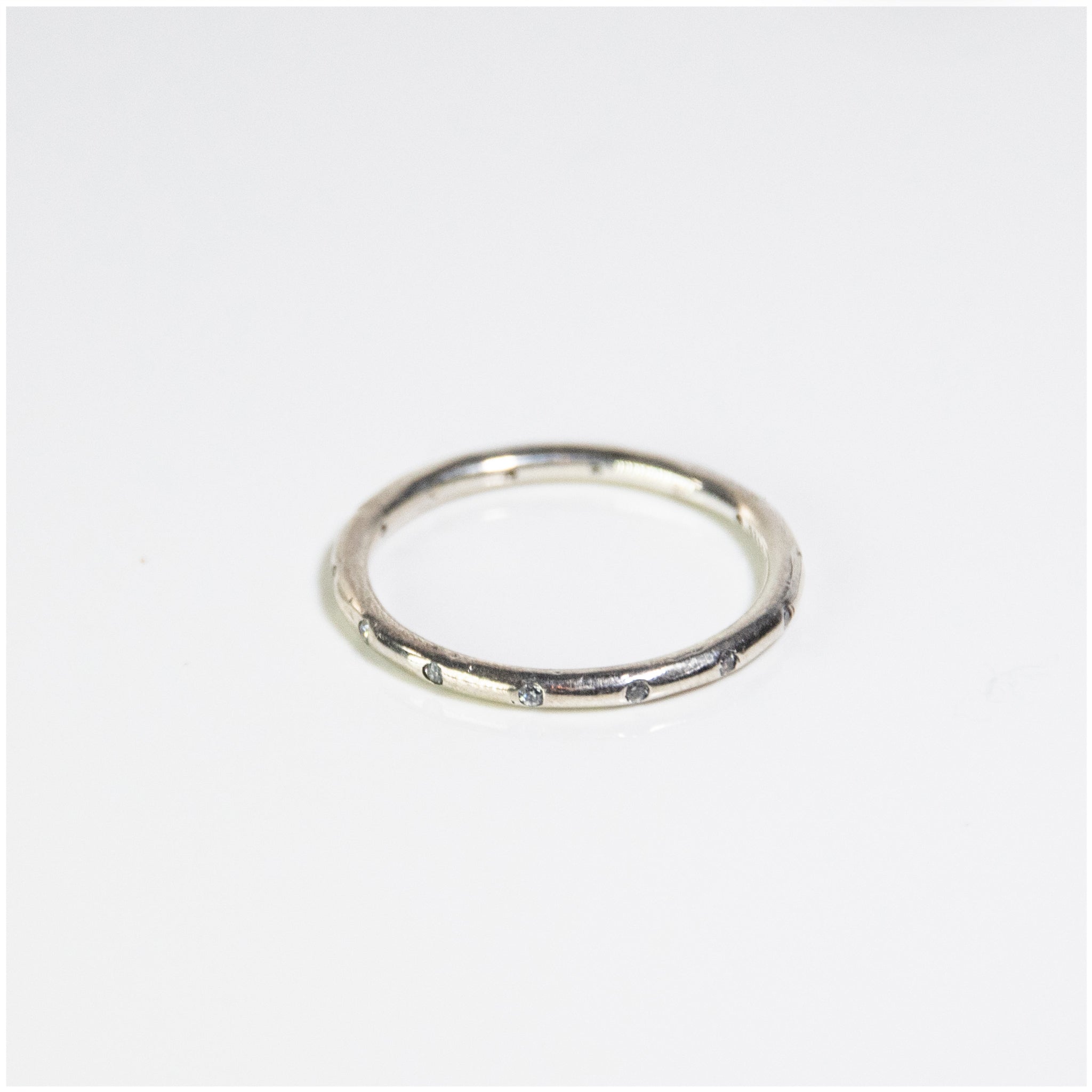R022 - Sterling Silver Ring with CZ Simulated Diamonds - silverby-e.co.za