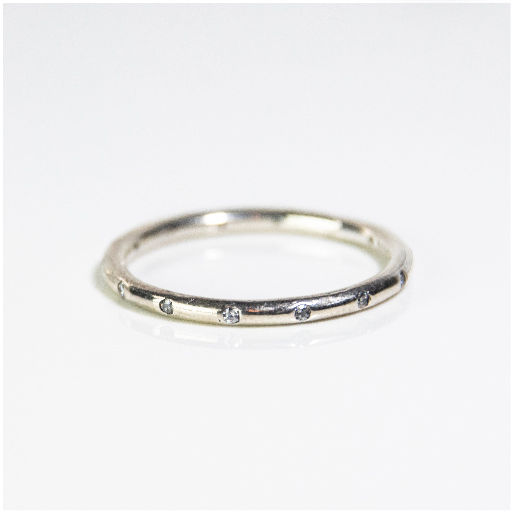 R022 - Sterling Silver Ring with CZ Simulated Diamonds - silverby-e.co.za